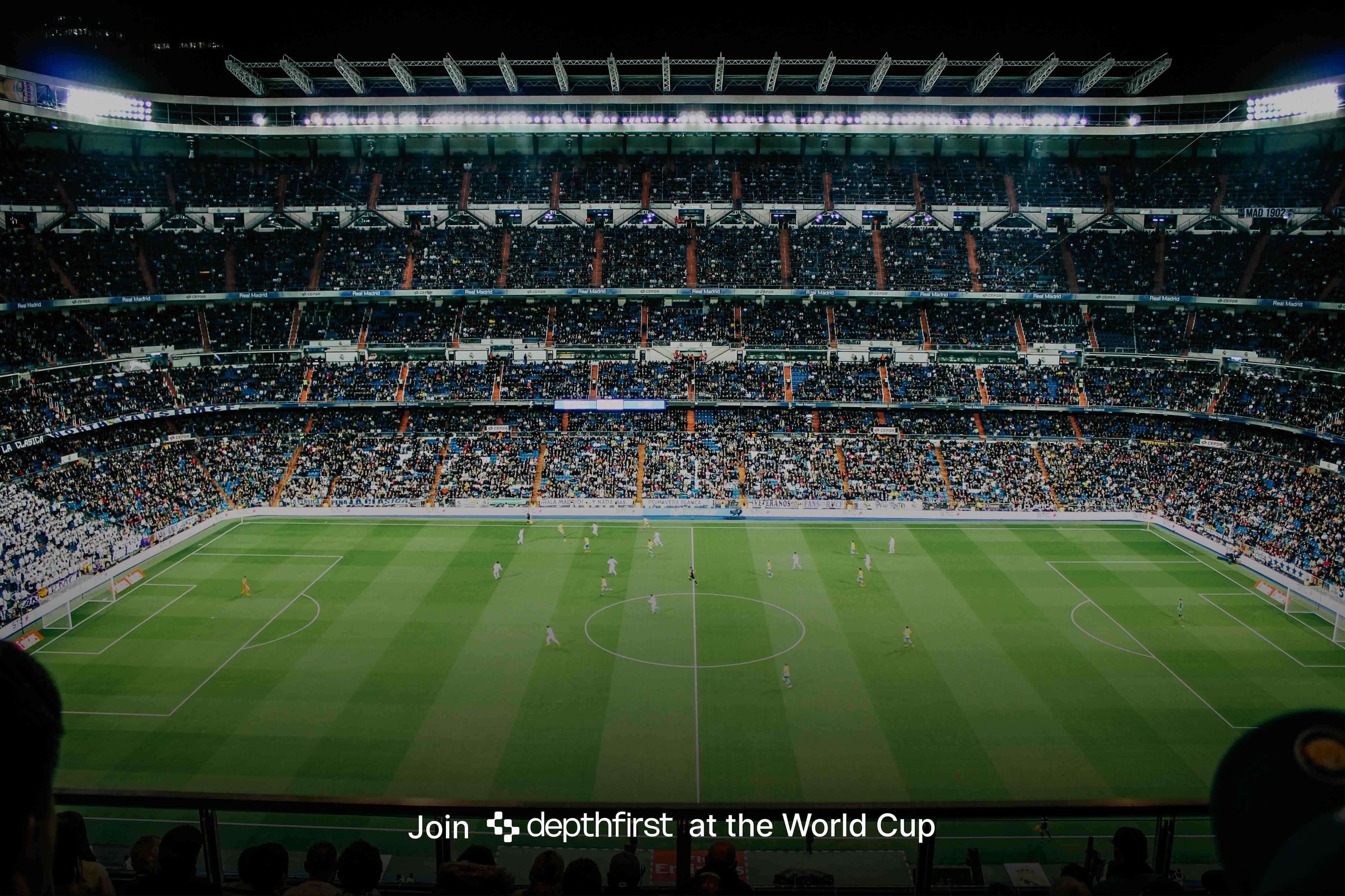 A live soccer match viewed from the stands with depthfirst World Cup promotion text.